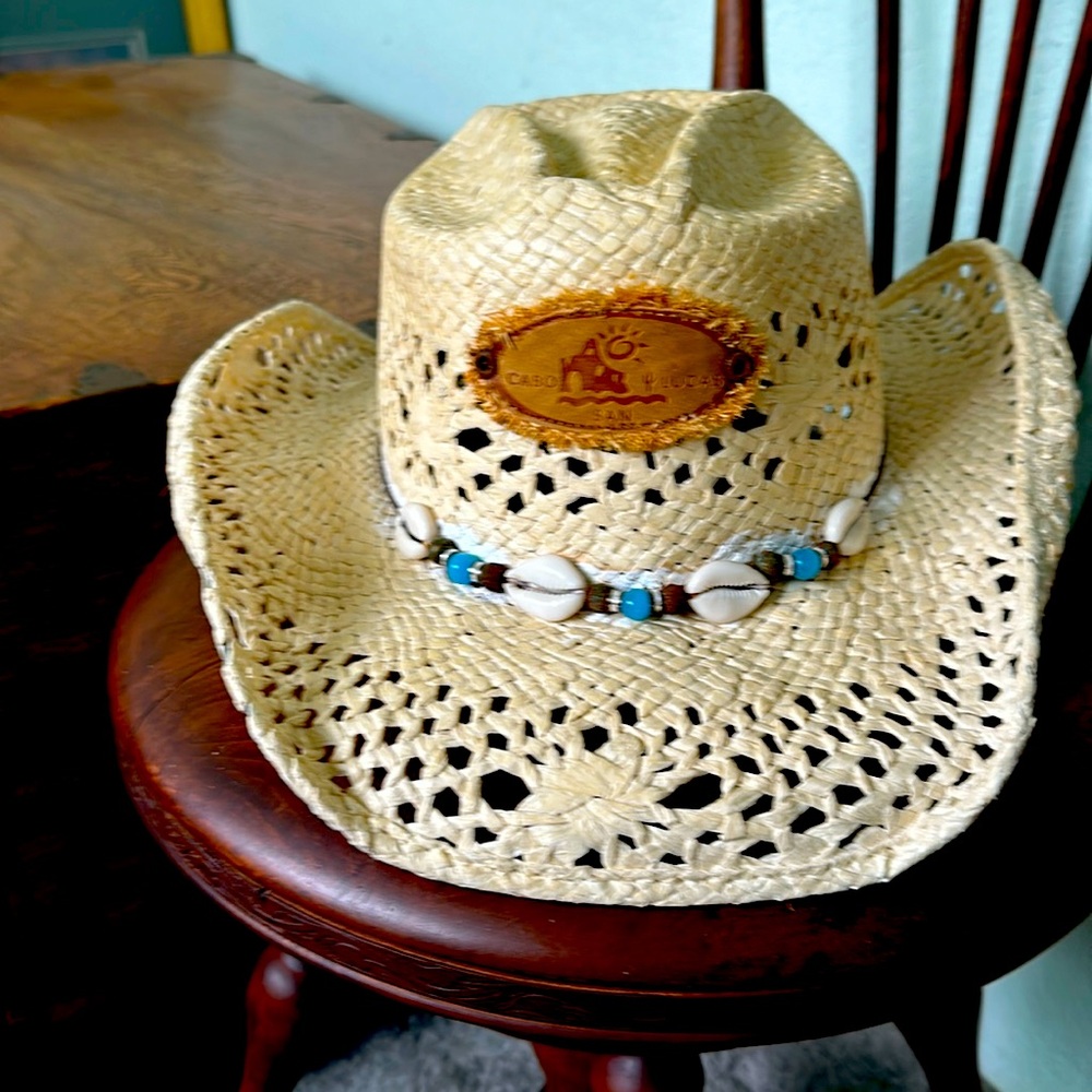 Beautiful straw hat with shells and beads!